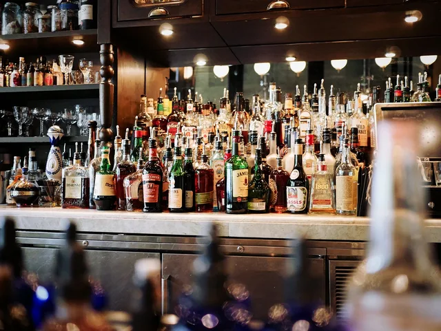 alcoholic beverages, bar, beer, bottles, glass bottles, liquors, alcoholic drinks, drinks, counter, pub, shelves, bar, bar, bar, bar, bar, beer. Alcohol licensing in Scotland compared with England and Wales for new operators