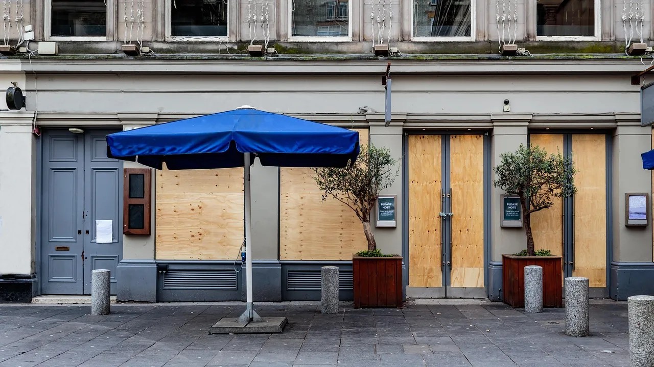 bar, pub, club, closed, shut, boarded up, parasol, city, street, empty, gray board