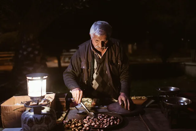 old man, night, chestnuts, peddler, street vendor, vendor, market, night market, elderly man, old man, old man, old man, old man, old man, market, market. London street trading licence: what to check